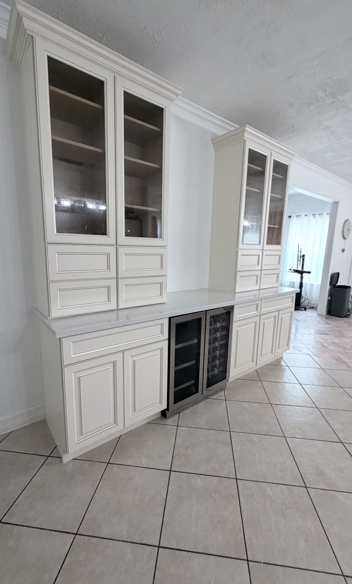 Cream glass-front hutch & bar